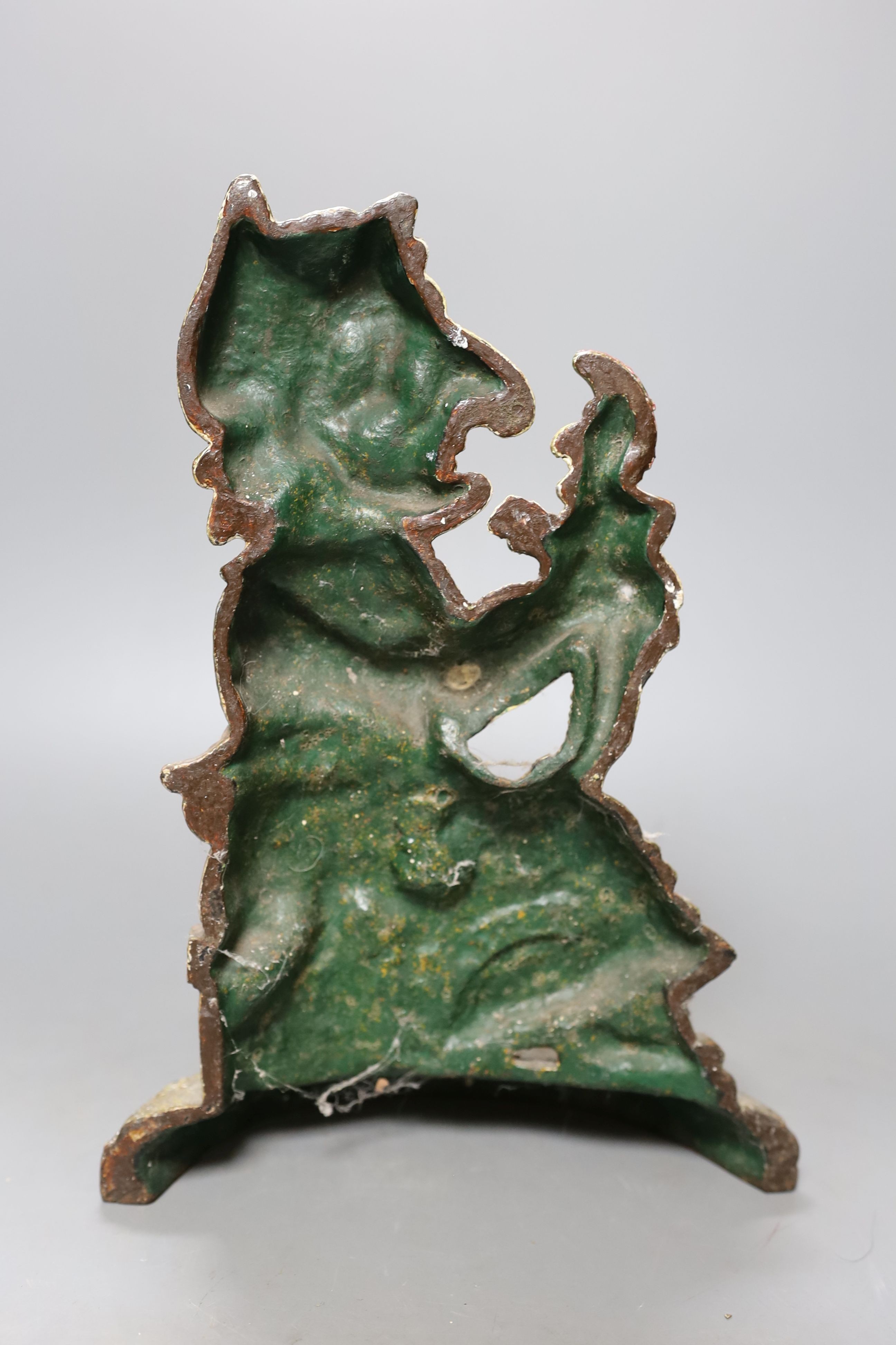 A Victorian painted cast iron Punch and Judy doorstop, 31 cms high.